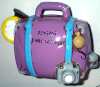 Valise de vacances avec appareil photo. (1990?)., - (GAD0145)