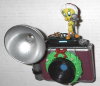 Oiseau: Titi sur un appareil avec flash. Décoration de Noël. (1997)., - (GAD0666)